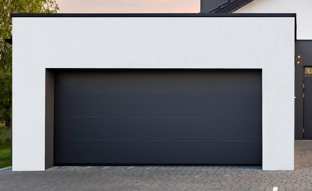 Porte de garage sectionnelle — motorisée